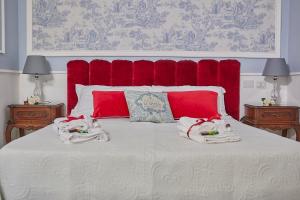 A bed or beds in a room at Il Piccolo Principe Affittacamere
