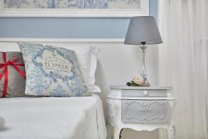 A bed or beds in a room at Il Piccolo Principe Affittacamere