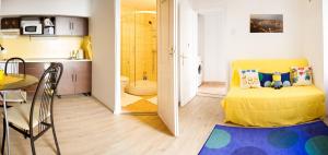 Posteľ alebo postele v izbe v ubytovaní Minion & Snoopy Apartman