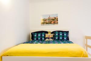 Posteľ alebo postele v izbe v ubytovaní Minion & Snoopy Apartman