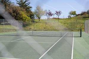 a tennis net on a tennis court at Links Country Park Hotel in Cromer