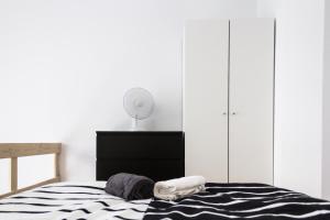 Posteľ alebo postele v izbe v ubytovaní Minion & Snoopy Apartman