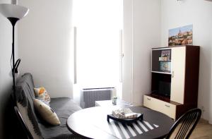 Televízia a/alebo spoločenská miestnosť v ubytovaní Minion & Snoopy Apartman