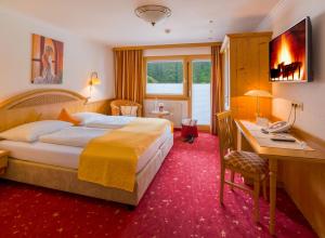 Katil atau katil-katil dalam bilik di Hotel-Garni Jakober +37 gambar