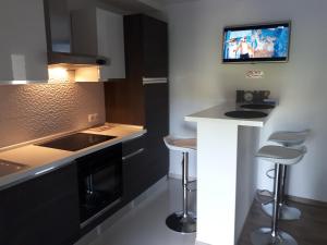 Kuchyň nebo kuchyňský kout v ubytování Apartman Škribulja + 18 fotografií