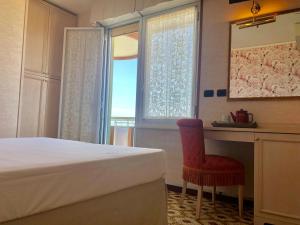 Postel nebo postele na pokoji v ubytování Hotel Flamingo