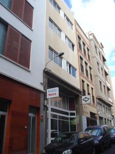 a building with a sign that reads hospital now at Pensión Mova in Santa Cruz de Tenerife