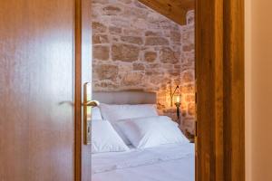 Postel nebo postele na pokoji v ubytování Honey house