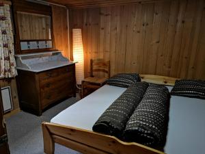 Postel nebo postele na pokoji v ubytování B&B Gassa 95