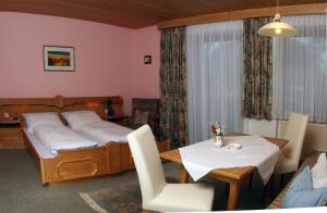Uma cama ou camas num quarto em Appartement Isabella