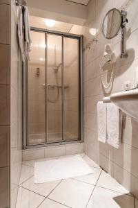 Kúpeľňa v ubytovaní Apartments Tschanun