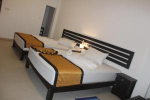 Uma cama ou camas num quarto em Hotel Senora