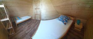 เตียงในห้องที่ Przystanek Morze