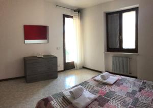Postel nebo postele na pokoji v ubytování La Terrazza di Beppe