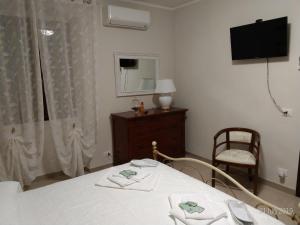 Posteľ alebo postele v izbe v ubytovaní Az. Agrituristica U'SPIGU
