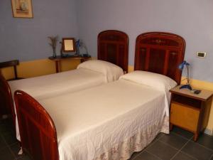 Posteľ alebo postele v izbe v ubytovaní Agriturismo La Riccardina