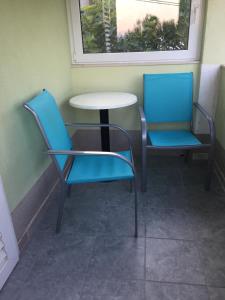 Posedenie v ubytovaní Apartmani Atila Damir