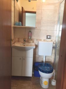 Kúpeľňa v ubytovaní Apartmani Atila Damir