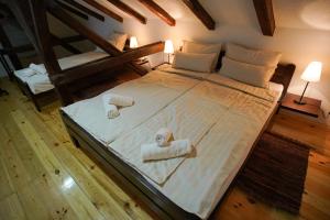 Cama ou camas em um quarto em Epicenter