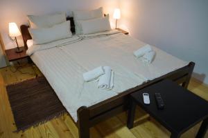 Cama ou camas em um quarto em Epicenter