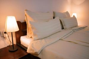 Cama ou camas em um quarto em Epicenter