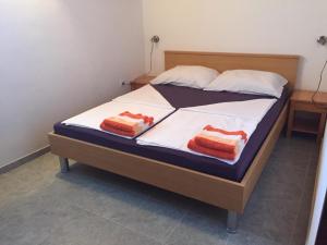 Posteľ alebo postele v izbe v ubytovaní Apartmani Atila Damir
