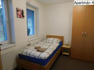 Posteľ alebo postele v izbe v ubytovaní Apartmány Horní Planá