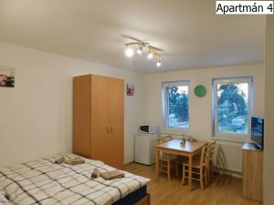 Posteľ alebo postele v izbe v ubytovaní Apartmány Horní Planá