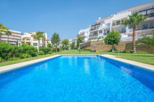 Bazén v ubytovaní Sea Flower Miraflores Golf and Beach Parking included alebo v jeho blízkosti