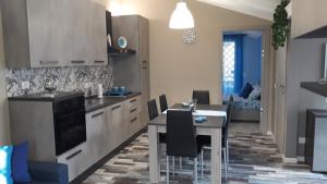 A kitchen or kitchenette at DA ISINOE