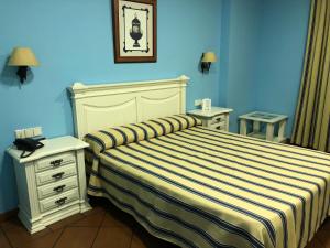 A bed or beds in a room at Los Bronces