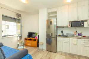 Charming Cozy Apartment Solitudo tesisinde mutfak veya mini mutfak