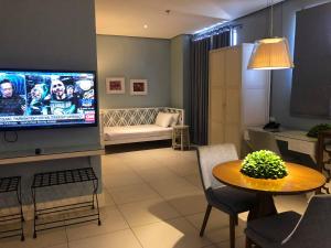 Televiisor ja/või meelelahutuskeskus majutusasutuses Hotel Lorenza