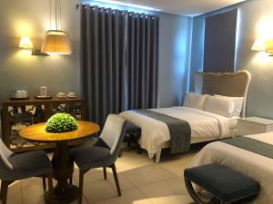 Voodi või voodid majutusasutuse Hotel Lorenza toas