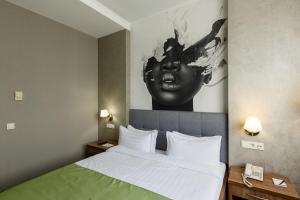 Postel nebo postele na pokoji v ubytování Renion Hills Hotel