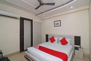 Voodi või voodid majutusasutuse Hotel Mandiram toas