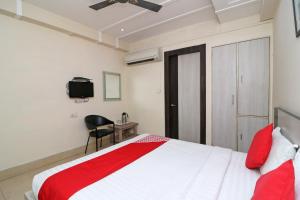 Voodi või voodid majutusasutuse Hotel Mandiram toas