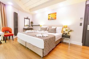 Postel nebo postele na pokoji v ubytování Antusa Design Hotel & Spa