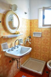 Ванная комната в Vagia Beach Apartments