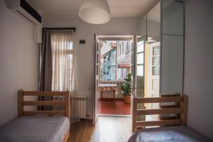 Katil atau katil-katil dalam bilik di Meidan Suites