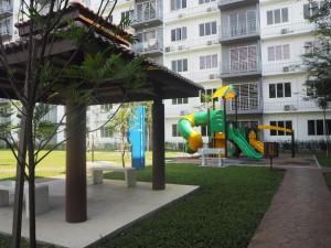a playground in front of a apartment building at DZR Homes Bangi Wonderland near UKM Malay Only in Kajang