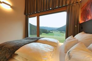 Posteľ alebo postele v izbe v ubytovaní Sunnig Nature Apartments
