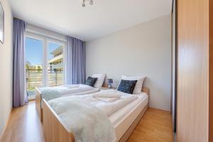 Voodi või voodid majutusasutuse Apartamenty Sun & Snow Zielone Tarasy toas