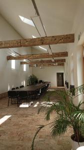 a large conference room with a long table and chairs at Maison am Liesingbach in Vienna
