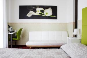 Posteľ alebo postele v izbe v ubytovaní Albergo Ristorante Belvedere