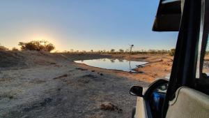 a view of a river from a vehicle at Mzsingitana Tented Camp in Hoedspruit