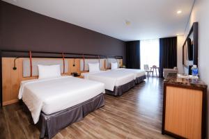 Ένα ή περισσότερα κρεβάτια σε δωμάτιο στο Dragon Style Hotel +29 φωτογραφίες