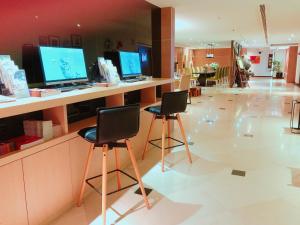 Televisor o centre d'entreteniment de Wemeet Hotel