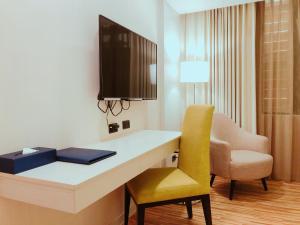 Televisor o centre d'entreteniment de Wemeet Hotel