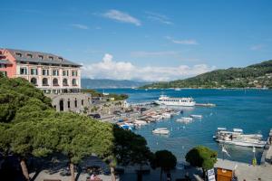 a group of boats docked in a body of water at Grand Hotel Portovenere in Portovenere